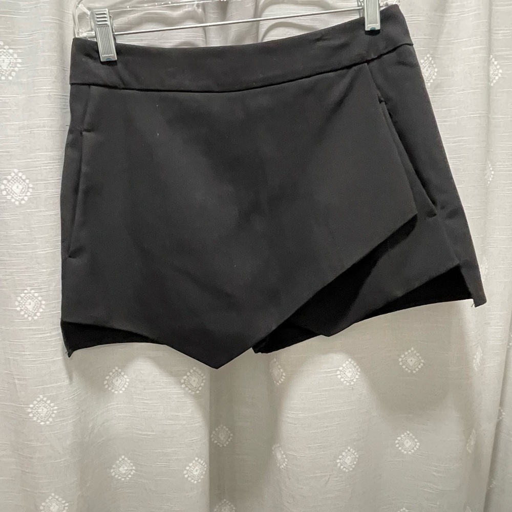 Black asymmetrical envelope skirt